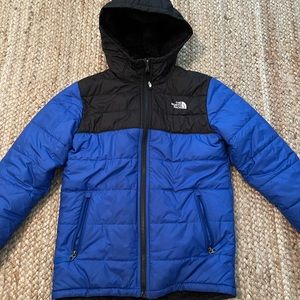 Reversible North Face puffer.